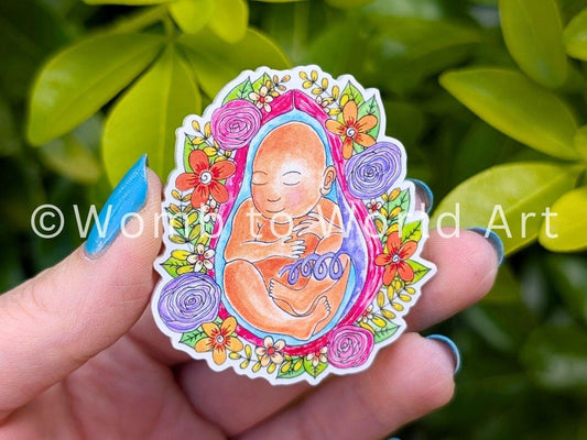 Baby in the womb art magnet